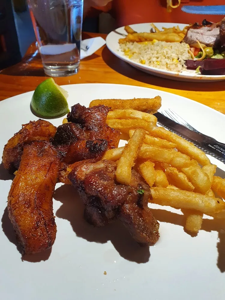Papas Fritas Con Carne de Cerdo